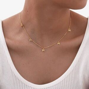 Elegant Gold Bow Necklace